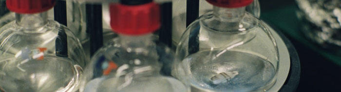 A picture of beakers in a spinning machine